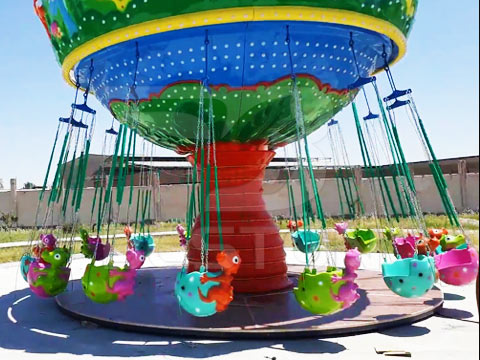 Детская цепочная карусель в Узбекистане